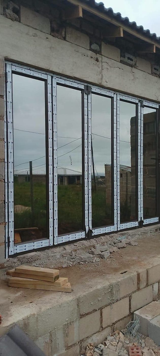Five panel folding window mid-installation